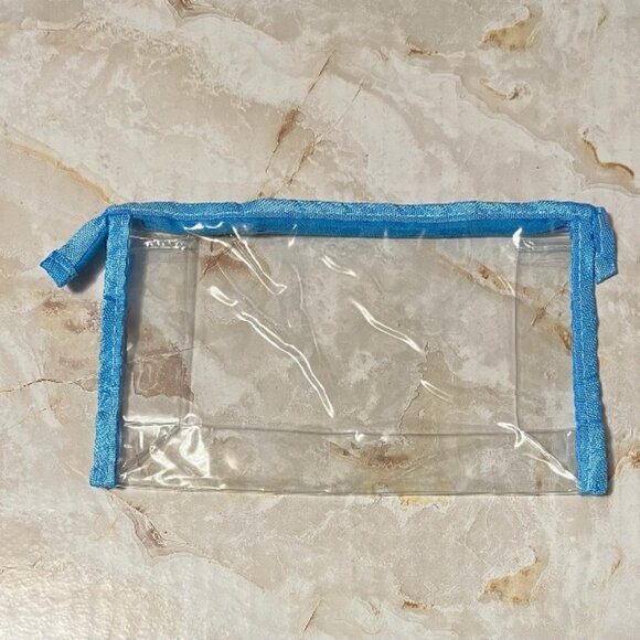 5" X 8.5" See Thru Zipper Cosmetic Bag with Blue Colored Trim - Picture 1 of 2